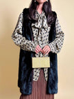 Gilet lungo in visone marrone con riflessi mogano