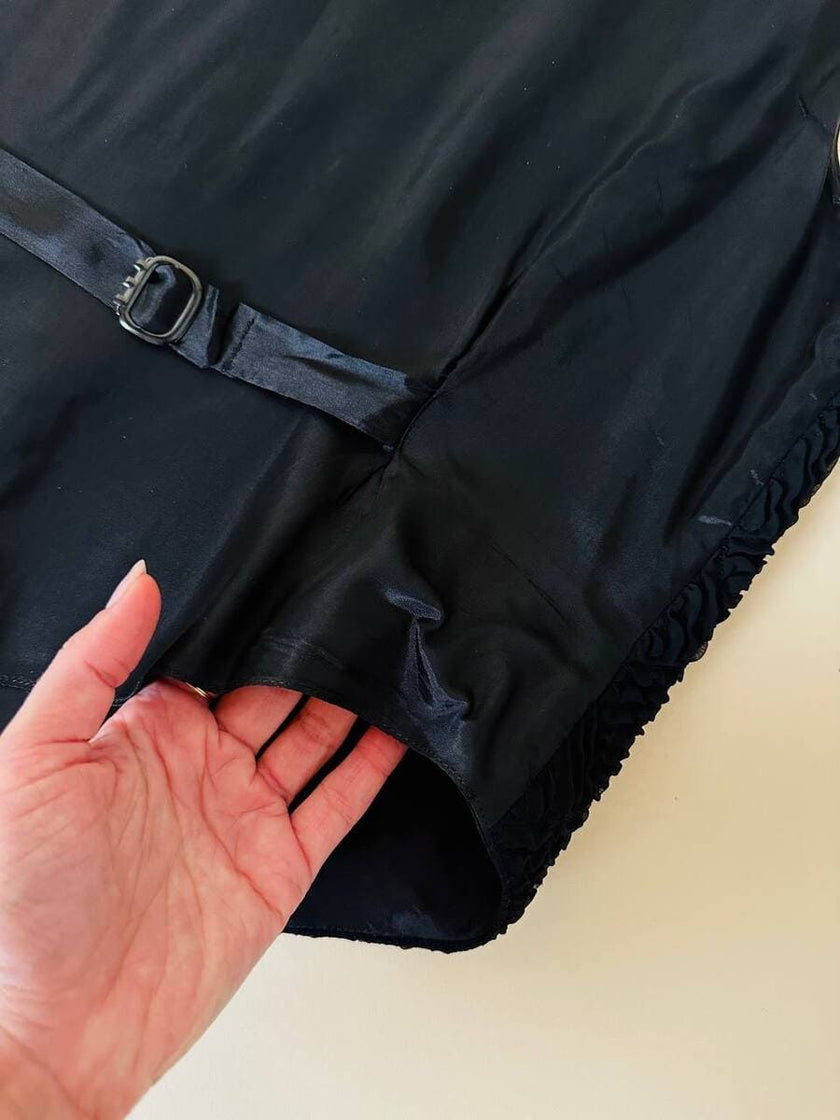 Gilet nero goffrato con bottoni dorati a forma di cuore “Yves Saint Laurent”
