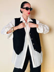 Gilet nero goffrato con bottoni dorati a forma di cuore “Yves Saint Laurent”