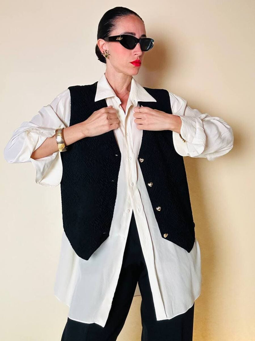Gilet nero goffrato con bottoni dorati a forma di cuore “Yves Saint Laurent”