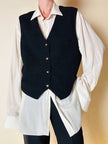 Gilet nero goffrato con bottoni dorati a forma di cuore “Yves Saint Laurent”