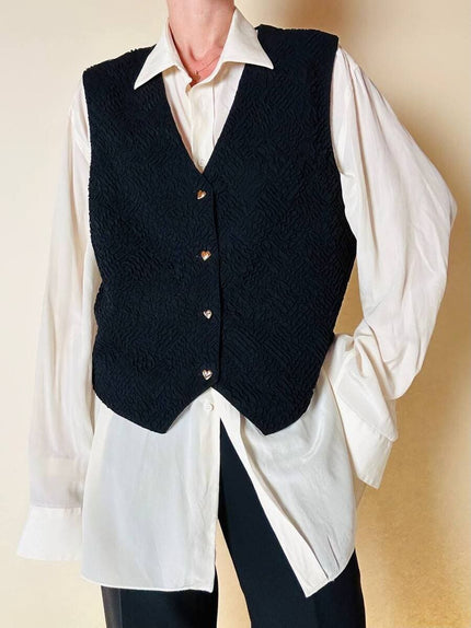 Gilet nero goffrato con bottoni dorati a forma di cuore “Yves Saint Laurent”