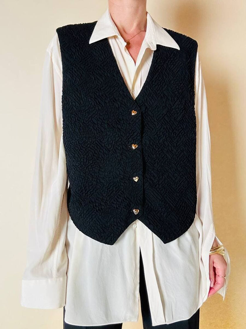 Gilet nero goffrato con bottoni dorati a forma di cuore “Yves Saint Laurent”