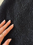 Gilet nero goffrato con bottoni dorati a forma di cuore “Yves Saint Laurent”