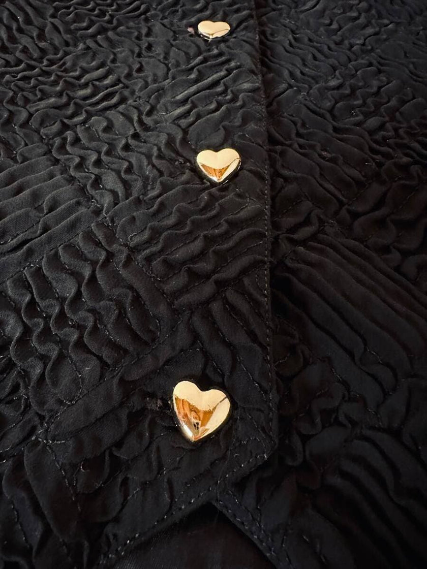 Gilet nero goffrato con bottoni dorati a forma di cuore “Yves Saint Laurent”