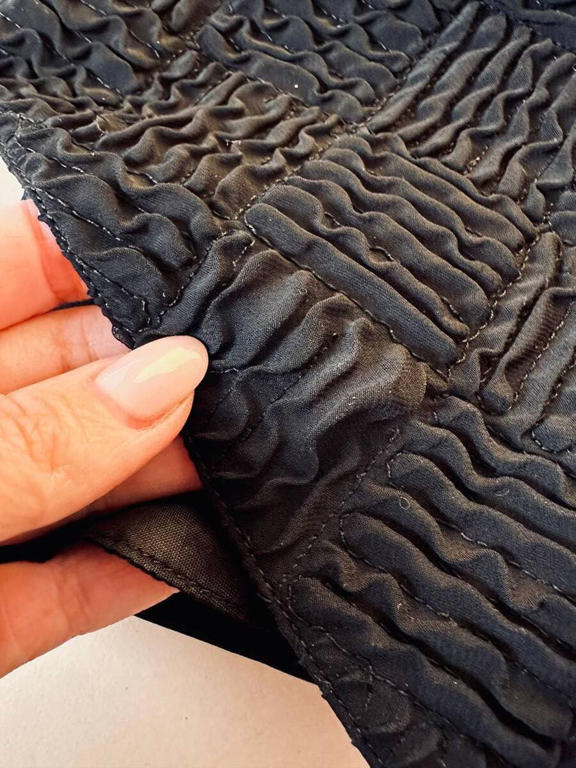 Gilet nero goffrato con bottoni dorati a forma di cuore “Yves Saint Laurent”