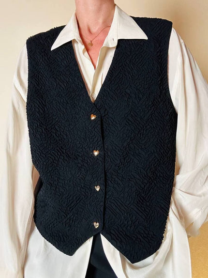 Gilet nero goffrato con bottoni dorati a forma di cuore “Yves Saint Laurent”