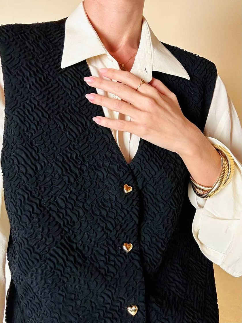 Gilet nero goffrato con bottoni dorati a forma di cuore “Yves Saint Laurent”