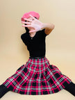 Gonna sartoriale a pieghe fantasia tartan fucsia e nera