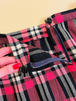 Gonna sartoriale a pieghe fantasia tartan fucsia e nera