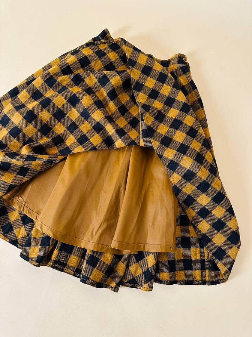 Jupe évasée en laine à motif damier jaune et noir