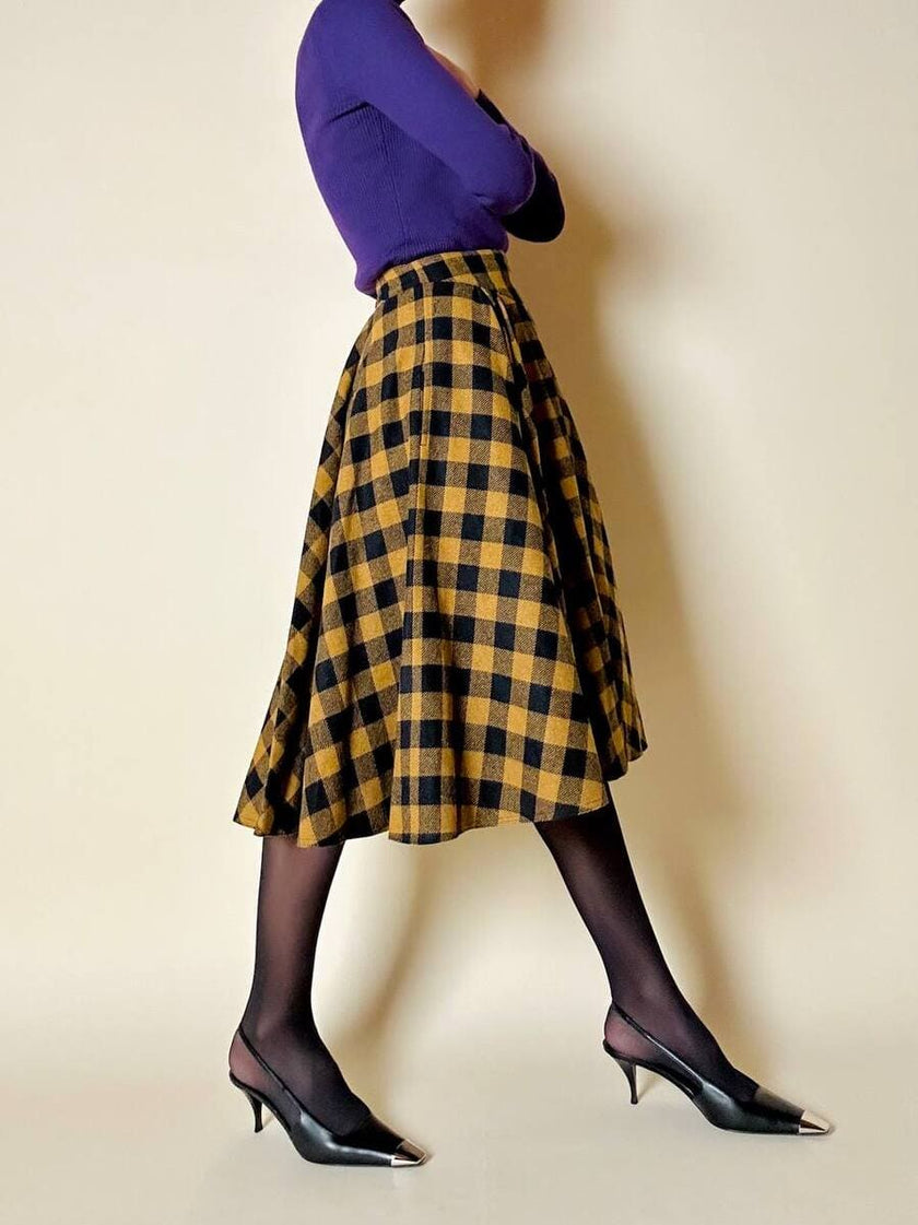 Jupe évasée en laine à motif damier jaune et noir