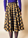 Jupe évasée en laine à motif damier jaune et noir