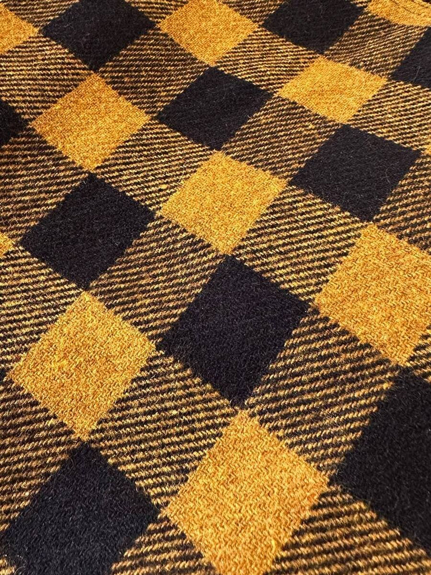 Jupe évasée en laine à motif damier jaune et noir