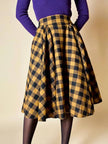 Jupe évasée en laine à motif damier jaune et noir