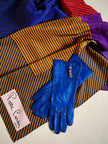 Guanti in nappa bluette con piccoli bottoni gioiello
