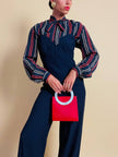 Jumpsuit blu con scollo a cuore “Fabrizio Lenzi”