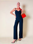 Jumpsuit blu con scollo a cuore “Fabrizio Lenzi”