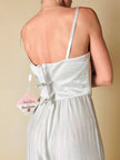Jumpsuit color perla con corpetto trapuntato in raso “Maby Pyeard” disegnato da Renato Balestra