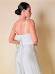 Jumpsuit color perla con corpetto trapuntato in raso “Maby Pyeard” disegnato da Renato Balestra