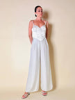 Jumpsuit color perla con corpetto trapuntato in raso “Maby Pyeard” disegnato da Renato Balestra