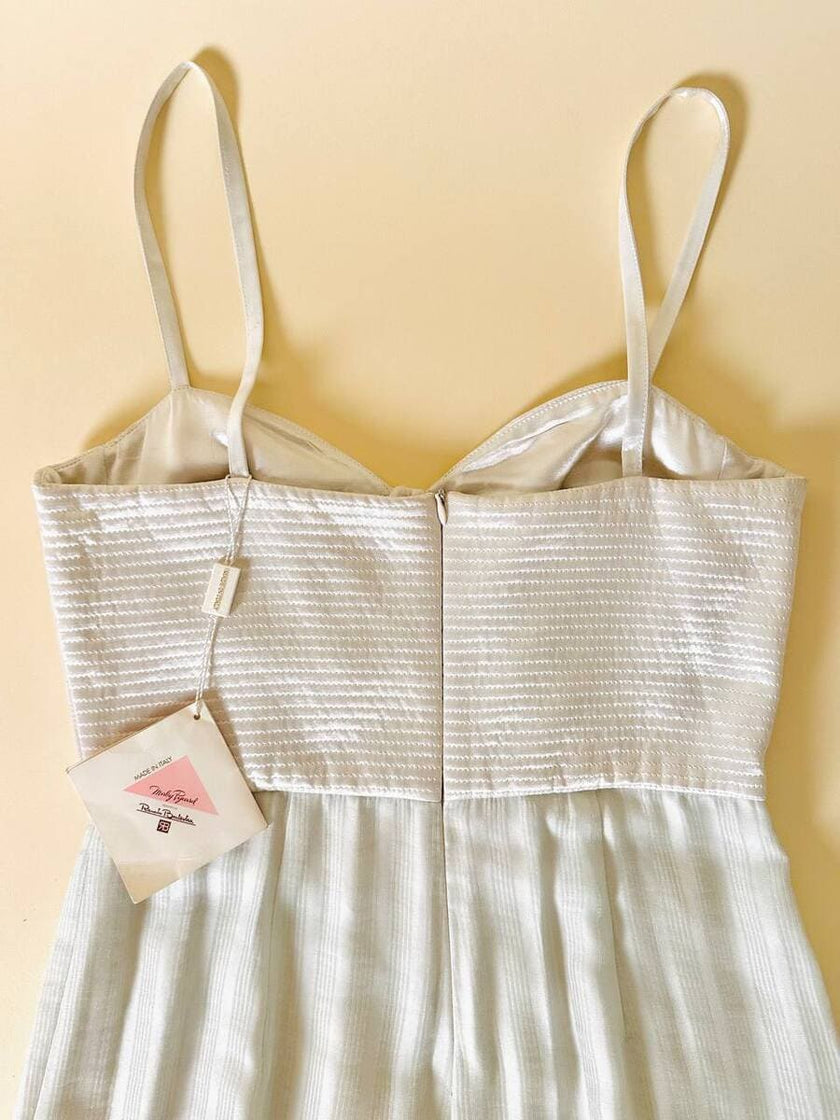 Jumpsuit color perla con corpetto trapuntato in raso “Maby Pyeard” disegnato da Renato Balestra