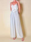 Jumpsuit color perla con corpetto trapuntato in raso “Maby Pyeard” disegnato da Renato Balestra