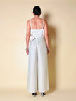 Jumpsuit color perla con corpetto trapuntato in raso “Maby Pyeard” disegnato da Renato Balestra