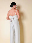 Jumpsuit color perla con corpetto trapuntato in raso “Maby Pyeard” disegnato da Renato Balestra