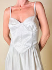 Jumpsuit color perla con corpetto trapuntato in raso “Maby Pyeard” disegnato da Renato Balestra