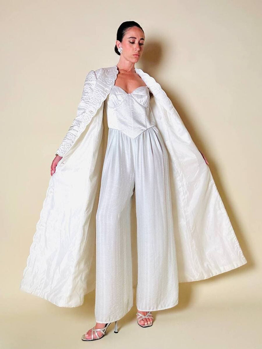Jumpsuit color perla con corpetto trapuntato in raso “Maby Pyeard” disegnato da Renato Balestra