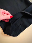 Jumpsuit nera a collo alto “Max Dixie”