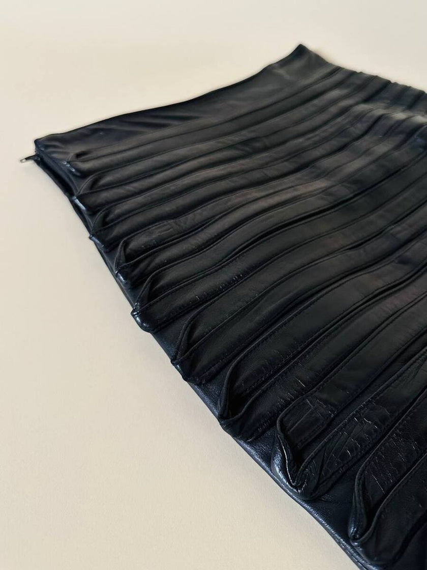 Longuette in pelle nera “Gianni Versace”