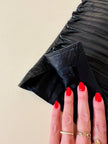 Longuette in pelle nera “Gianni Versace”