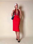 Longuette rossa con abbottonatura posteriore “Yves Saint Laurent”