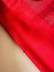 Longuette rossa con abbottonatura posteriore “Yves Saint Laurent”