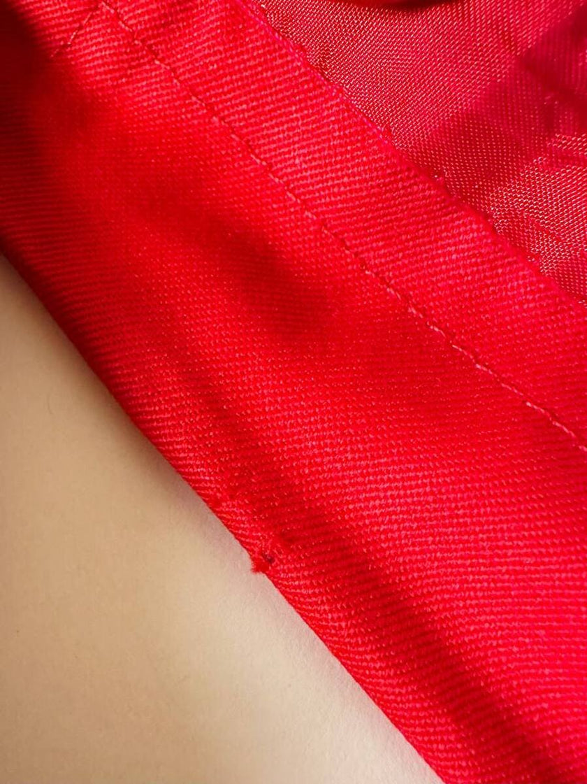 Longuette rossa con abbottonatura posteriore “Yves Saint Laurent”