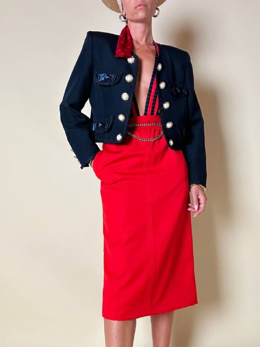 Longuette rossa con abbottonatura posteriore “Yves Saint Laurent”