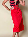 Longuette rossa con abbottonatura posteriore “Yves Saint Laurent”
