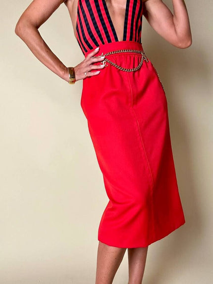 Longuette rossa con abbottonatura posteriore “Yves Saint Laurent”