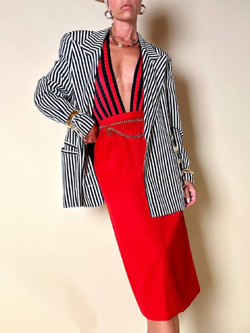 Longuette rossa con abbottonatura posteriore “Yves Saint Laurent”