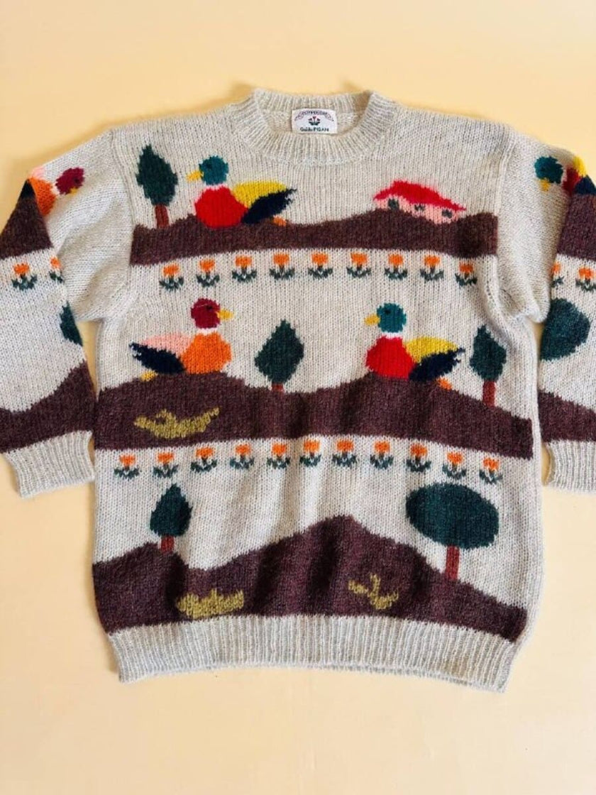 Maglione in lana écru fantasia papere 