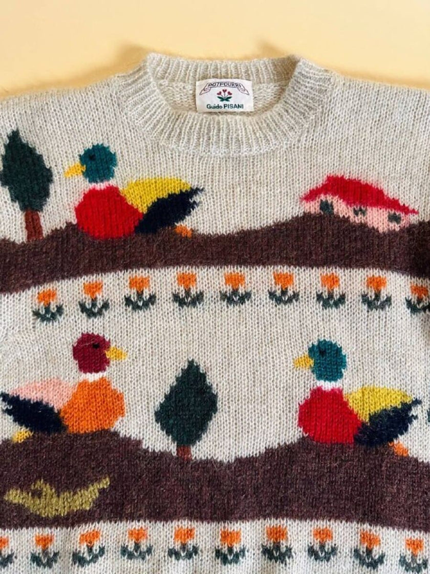 Maglione in lana écru fantasia papere 