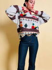Maglione in lana écru fantasia papere 