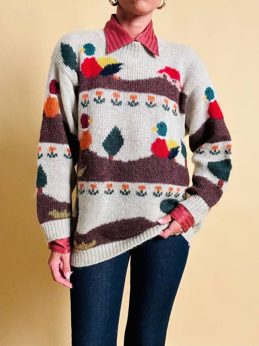 Maglione in lana écru fantasia papere 