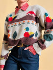 Maglione in lana écru fantasia papere 