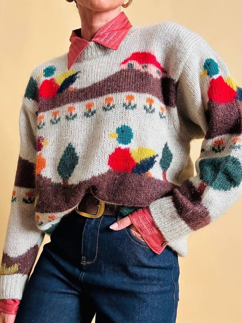 Maglione in lana écru fantasia papere 