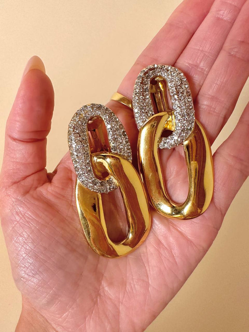 Maxi clip oro a catena con strass  “Yves Saint Laurent”