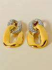 Maxi clip oro a catena con strass  “Yves Saint Laurent”
