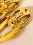 Maxi clip oro a catena con strass  “Yves Saint Laurent”